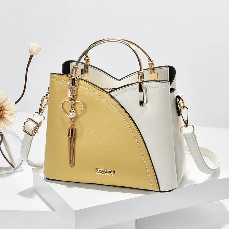 Julia – Beige and White Two-Tone Handbag with Gold Accents and Top Handle