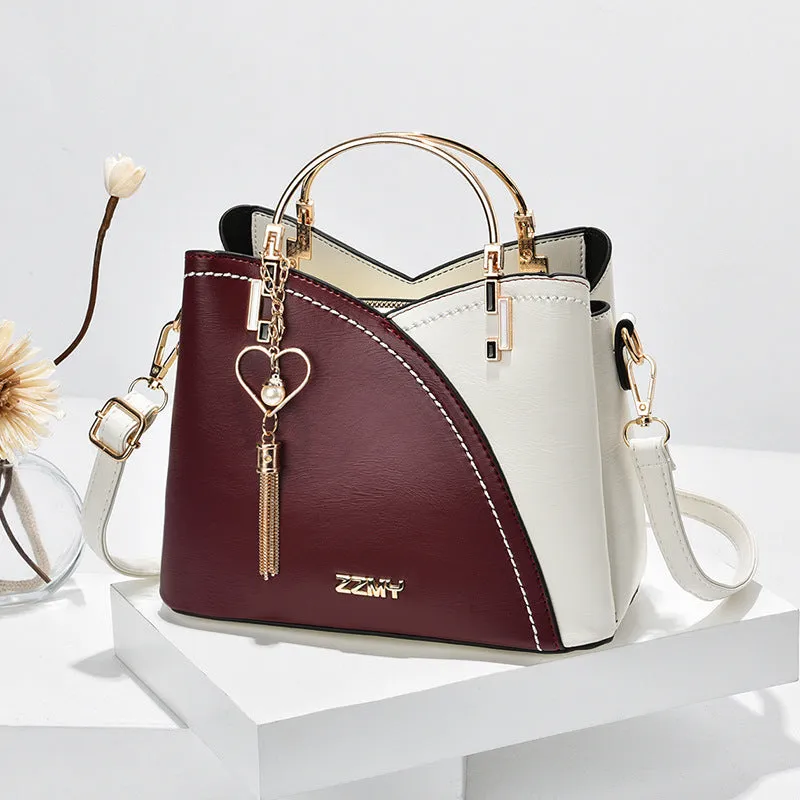 Julia – Beige and White Two-Tone Handbag with Gold Accents and Top Handle
