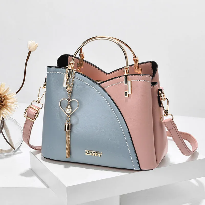 Julia – Beige and White Two-Tone Handbag with Gold Accents and Top Handle