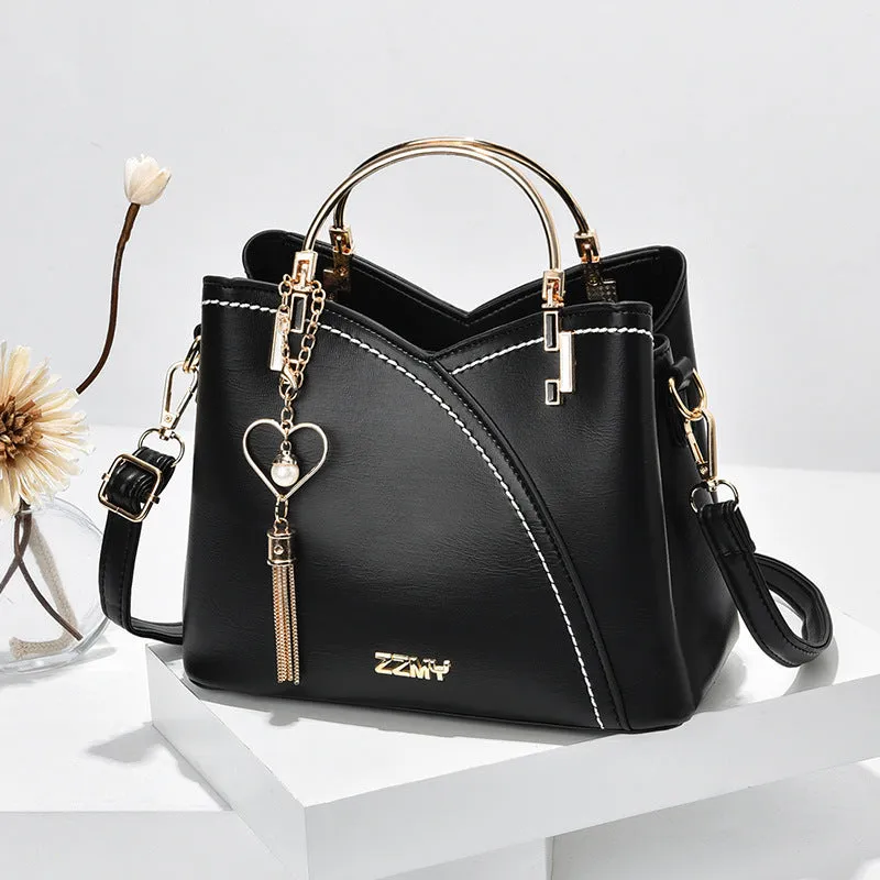 Julia – Beige and White Two-Tone Handbag with Gold Accents and Top Handle