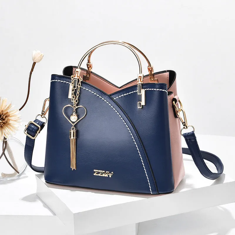 Julia – Beige and White Two-Tone Handbag with Gold Accents and Top Handle