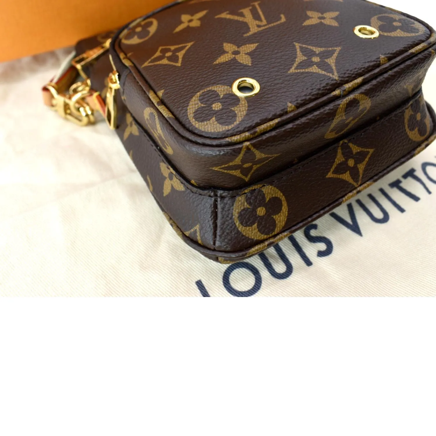 LOUIS VUITTON Utility Phone Sleeve Monogram Canvas Crossbody Bag Brown